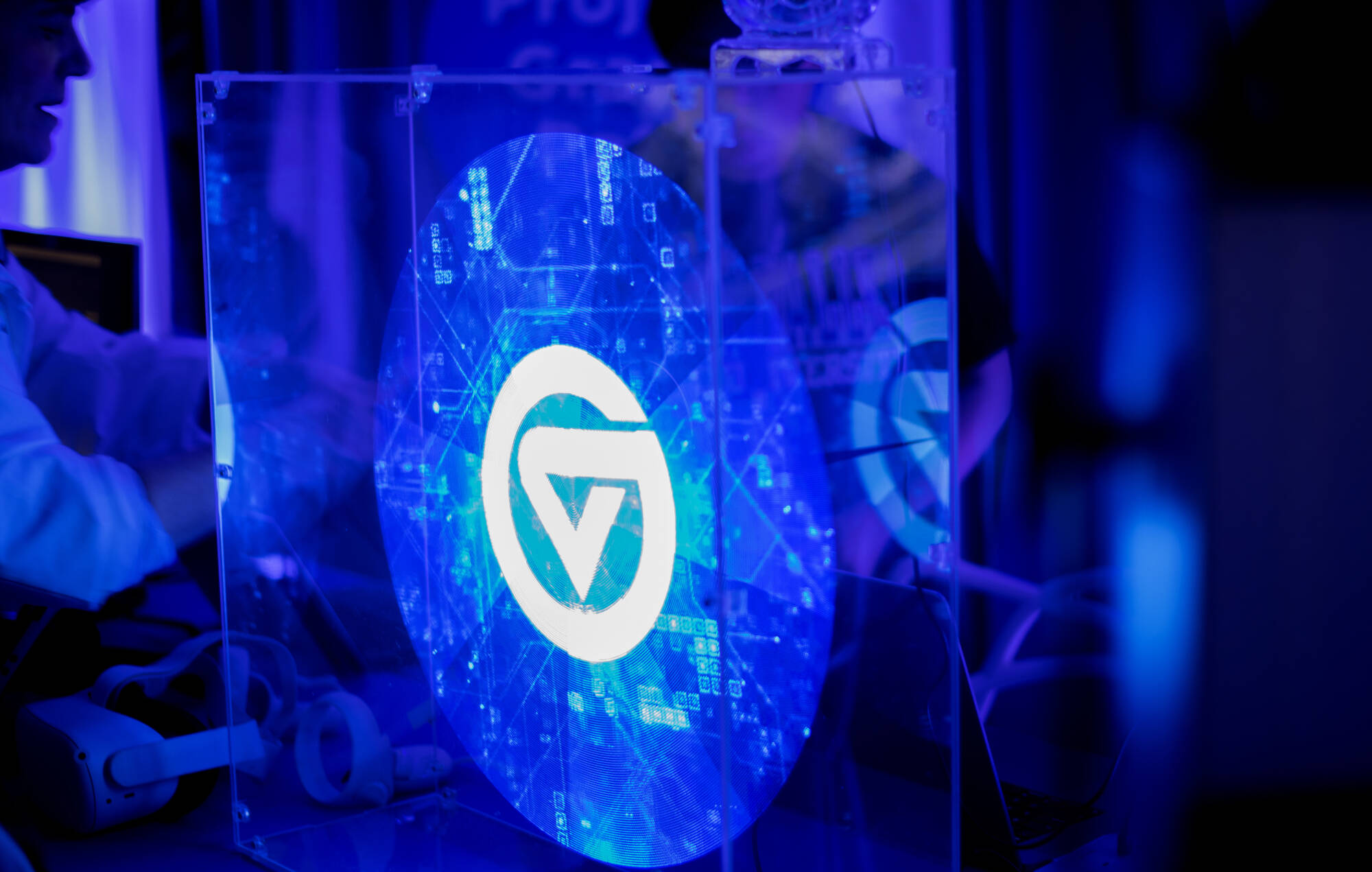 Julie Goldstein, associate professor in film and video production, left, showcases tech during GVSU's "The Blue Dot Experience," event as part of Tech Week GR.